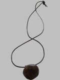 DESIGNS BY SONIA, ANTIQUE BRASS OVAL SHAPE, WITH BLACK LEATHER