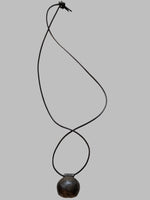 DESIGNS BY SONIA, ANTIQUE BRASS OVAL SHAPE, WITH BLACK LEATHER