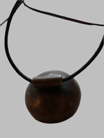 DESIGNS BY SONIA, ANTIQUE BRASS OVAL SHAPE, WITH BLACK LEATHER