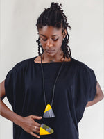 YELLOW, BLACK AND WHITE TRIANGLE NECKLACE WITH BLACK LEATHER, DESIGNS BY SONIA